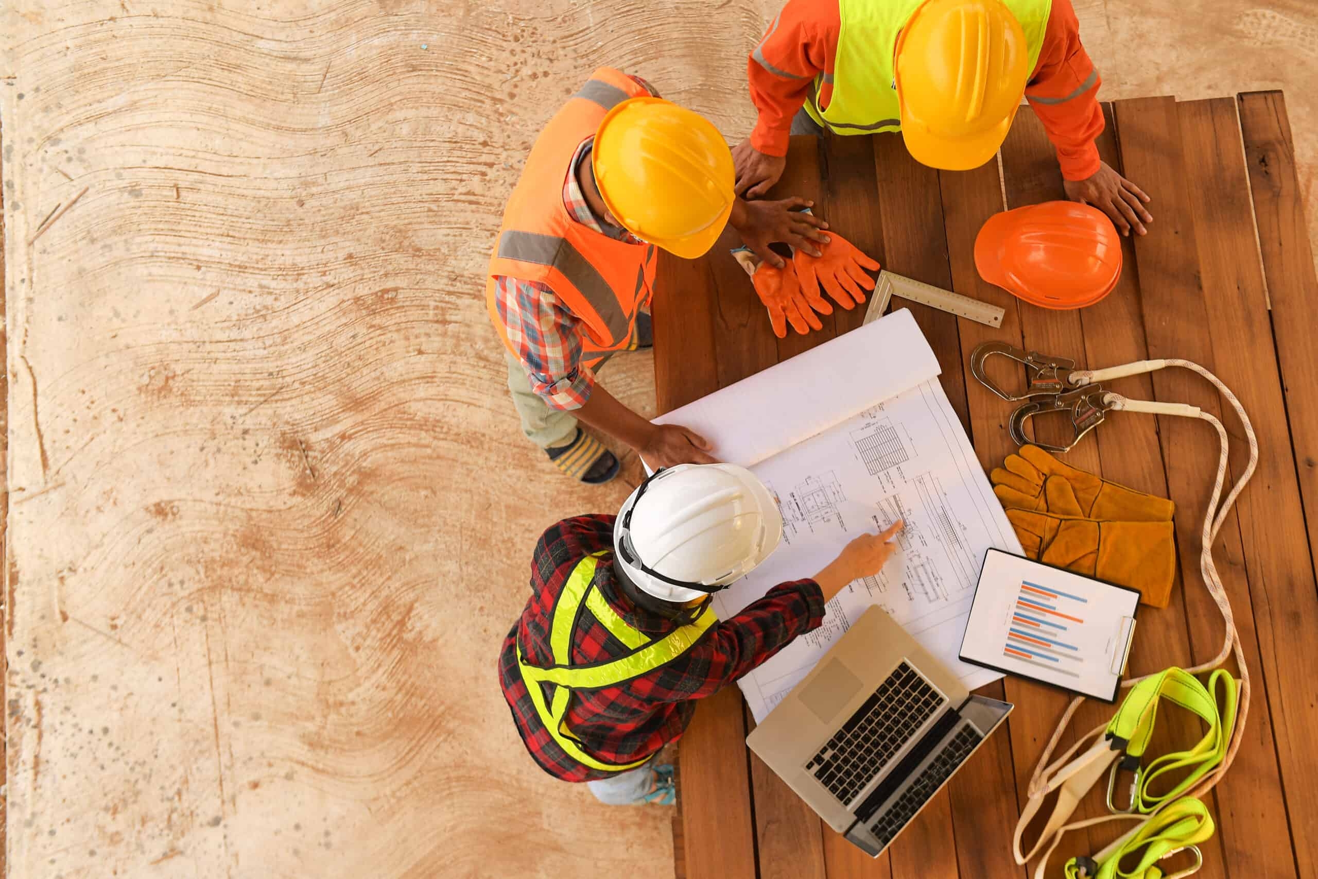 A roofer and a customer talking outside of a house.