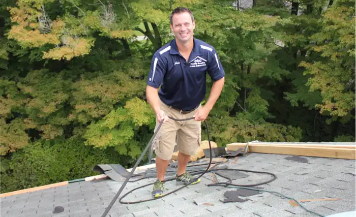 man fixing roof