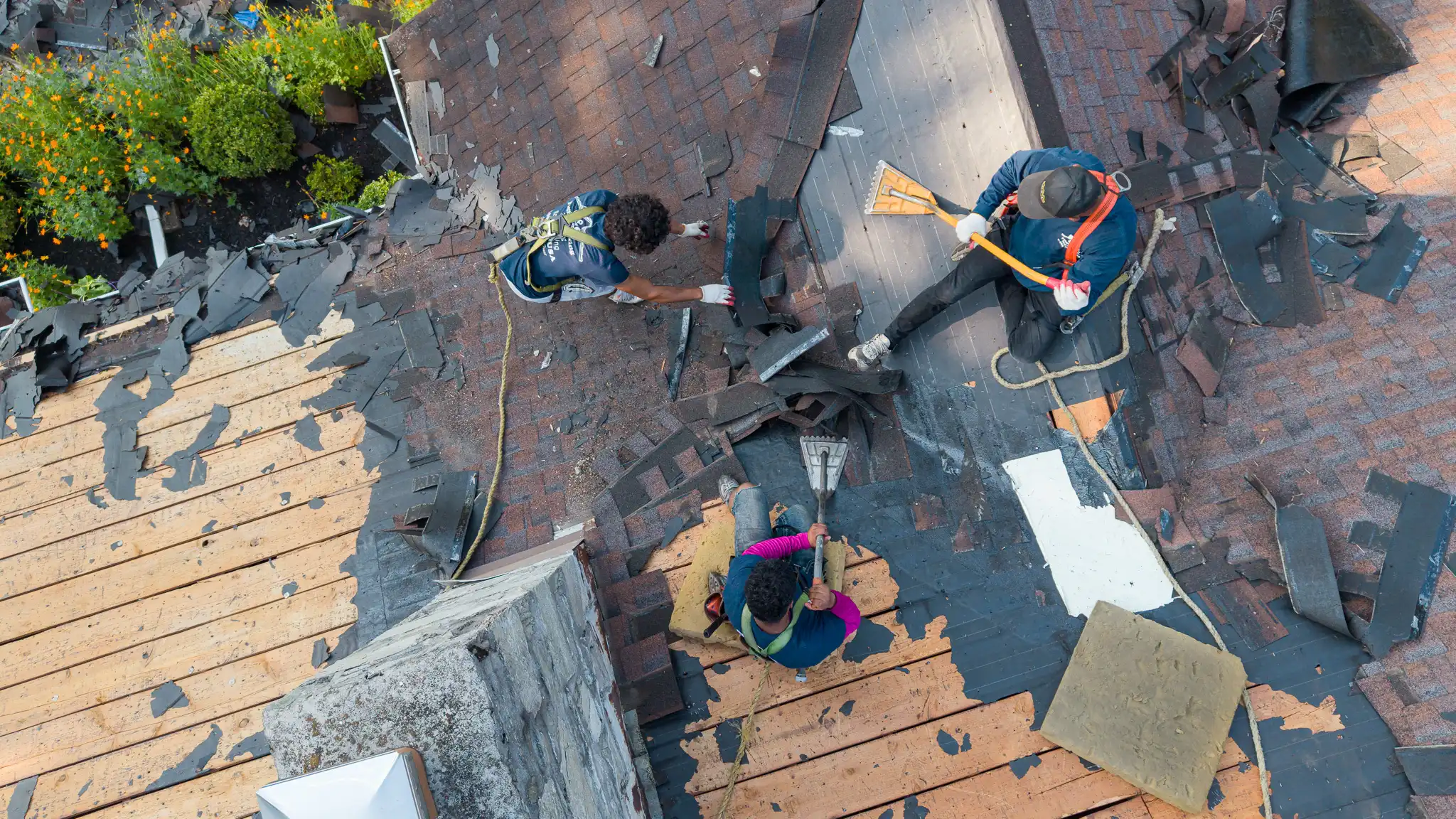 man fixing roof